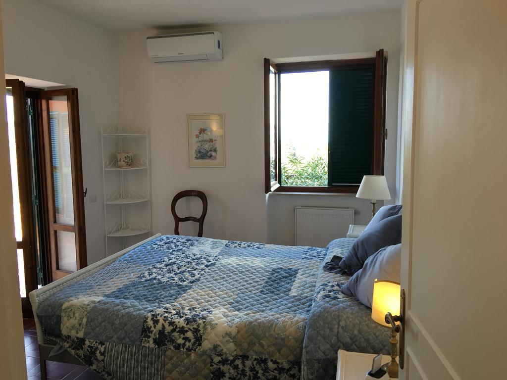 Casa Azzurra Apartment Порто Санто Стефано Екстериор снимка